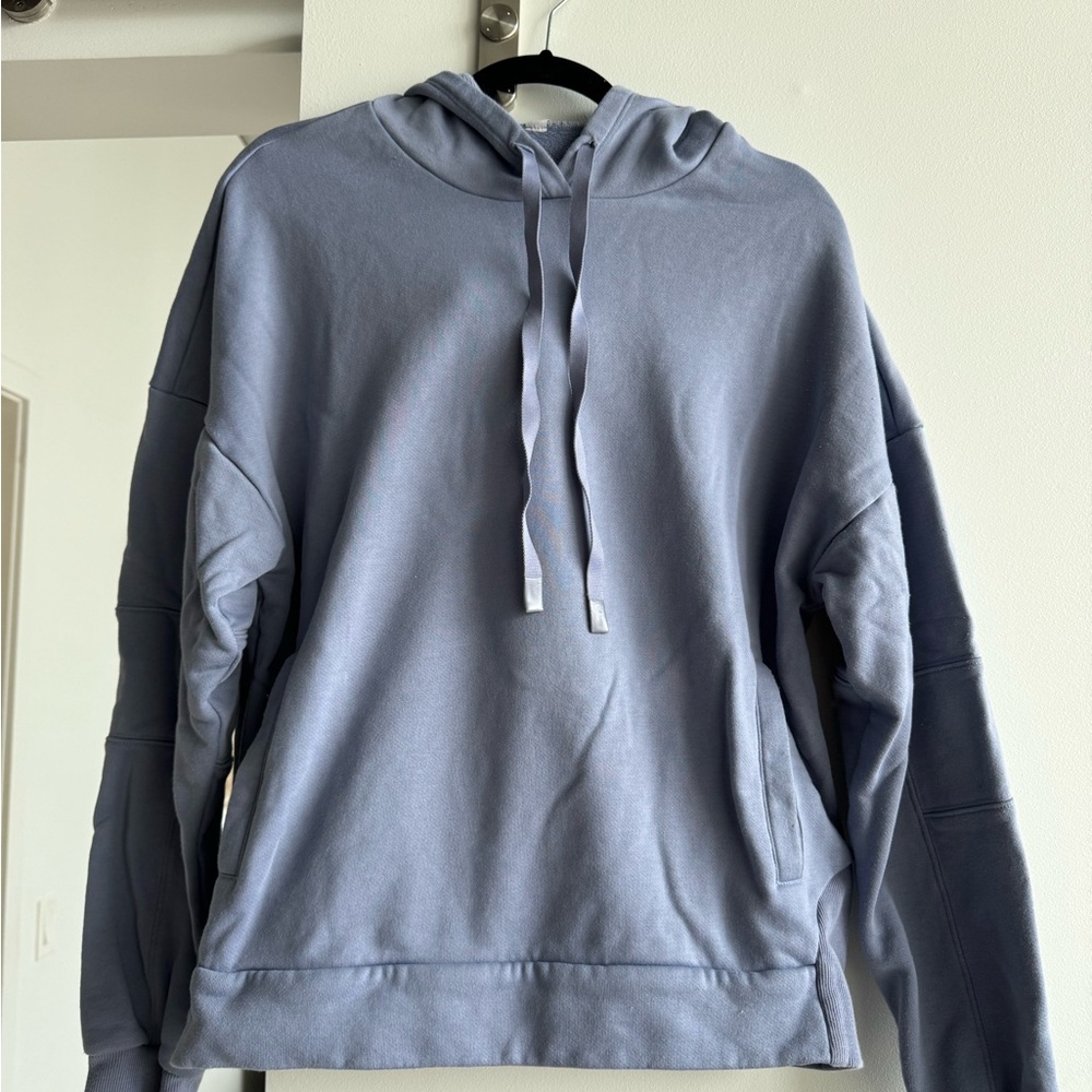 Two Alo sweatshirts (one green and one purple) barely worn and very comfortable